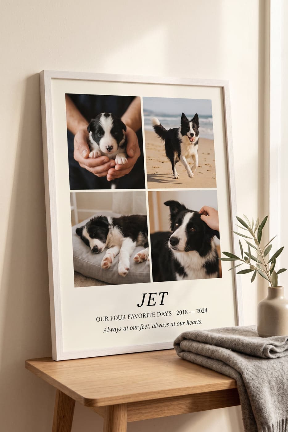 A framed white-oak Memory Poster on a wooden bench showing a four-photo grid of a black-and-white border collie at different ages, with the caption JET · OUR FOUR FAVORITE DAYS · 2018–2024 · Always at our feet, always at our hearts